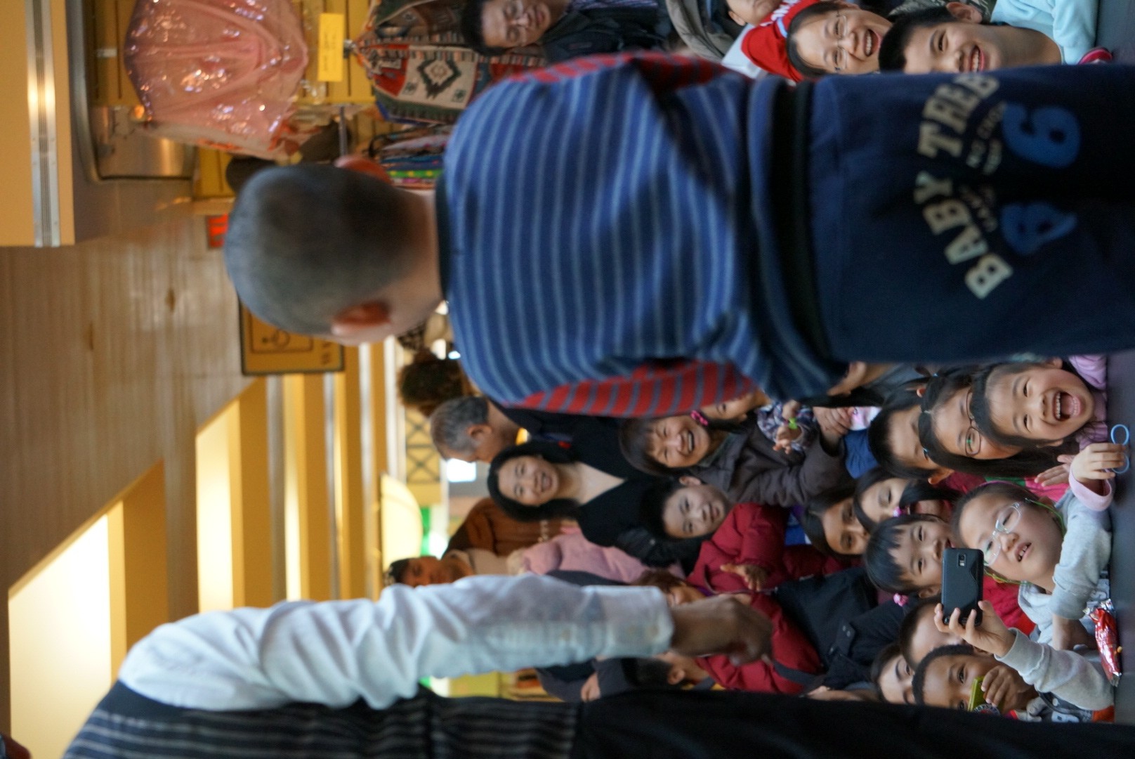 Kids and adults amazed by magic